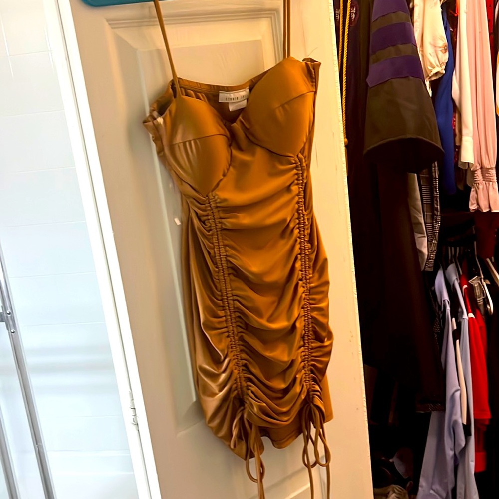 Brown woman’s cocktail dress